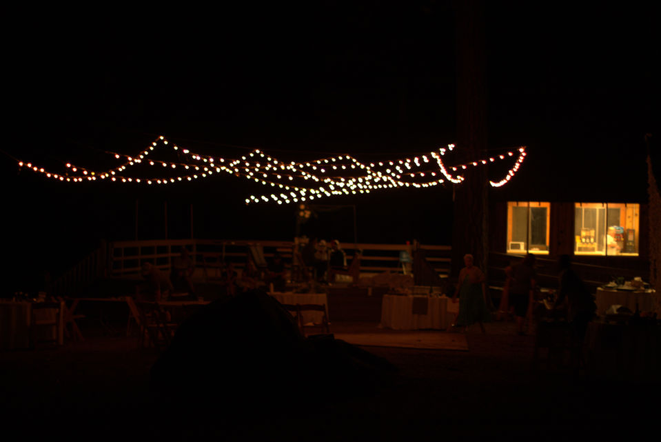 Bistro lights hung from dining hall twinkle in otherwise dark evening.