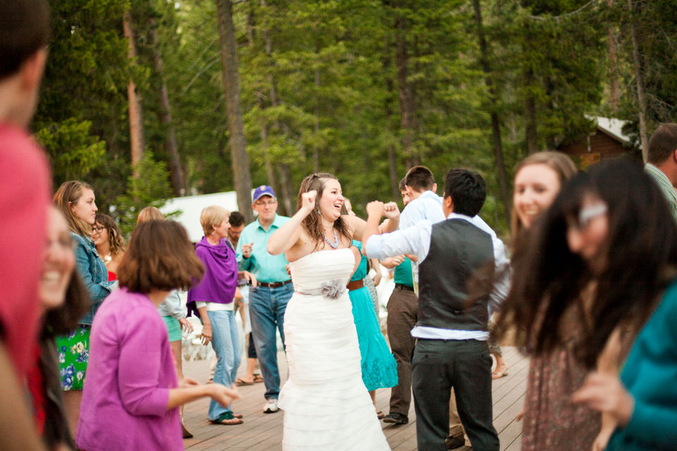 Wedding couple and guests dancing.