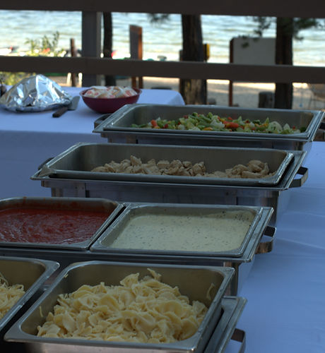 A pasta buffet on the deck of the dining hall.